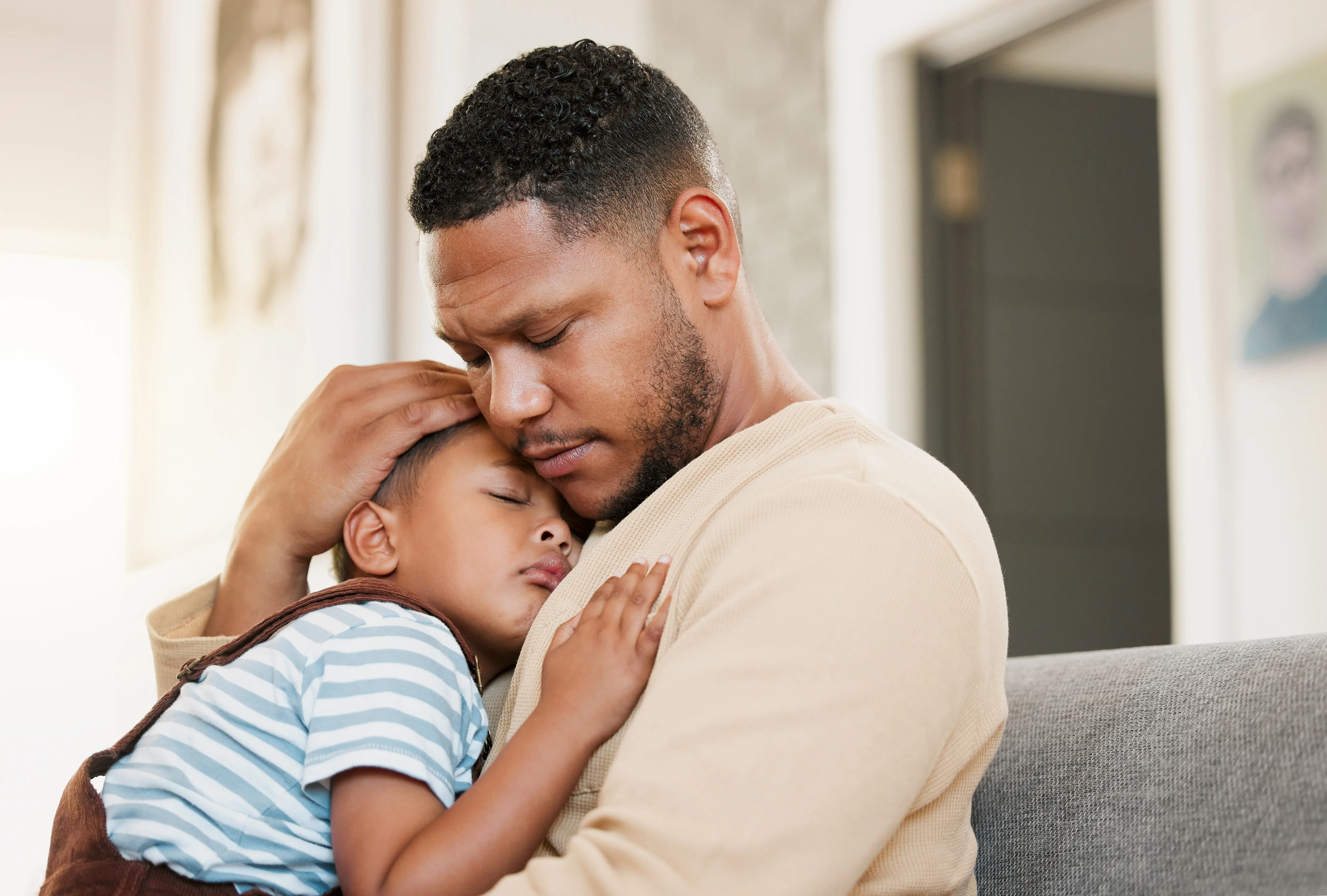 parent helping child regulate emotions