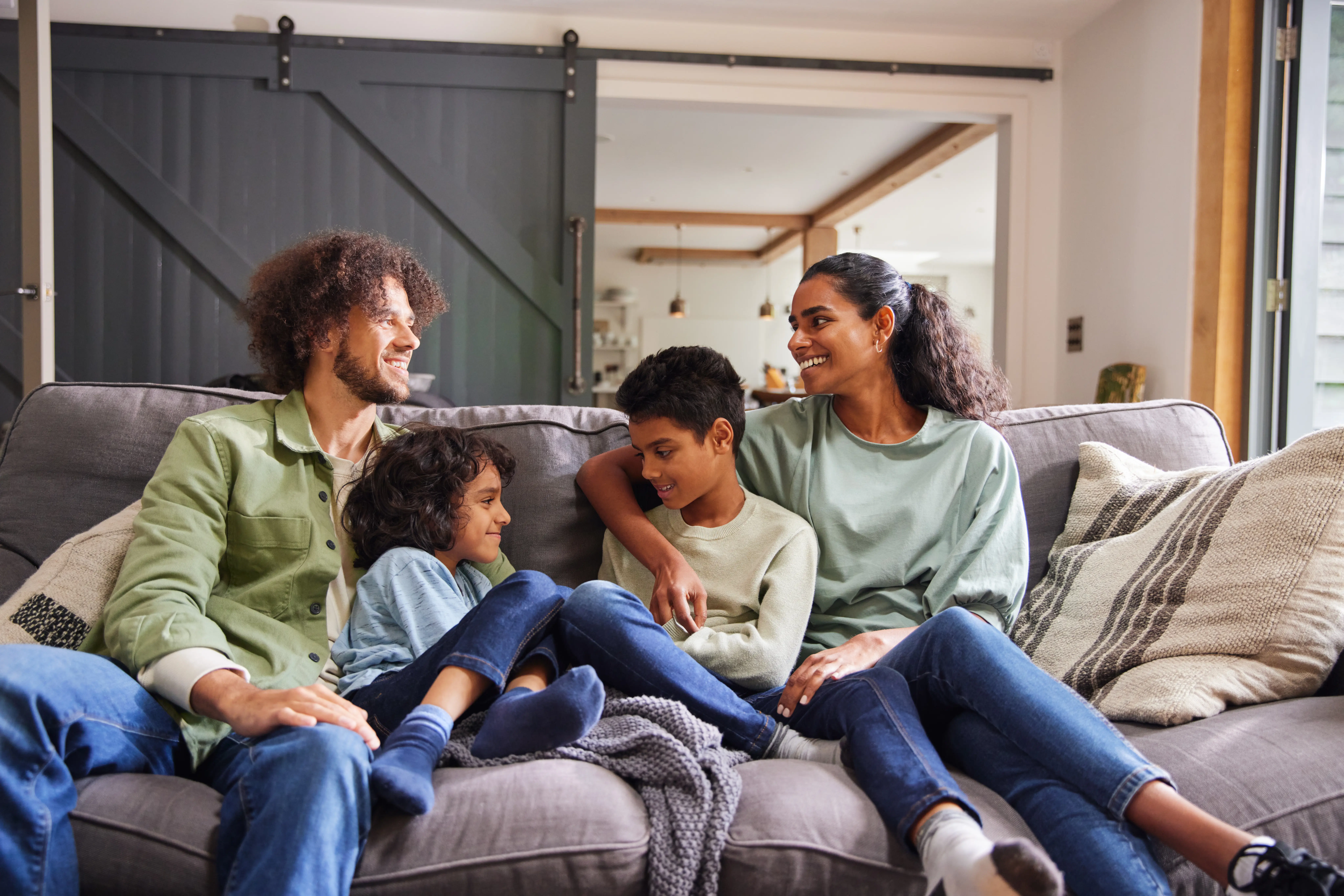 family on couch at home
